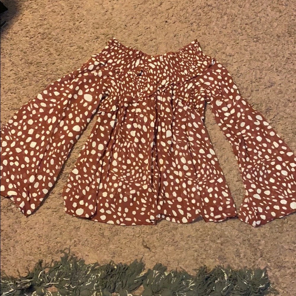 Blouse large fits like medium!